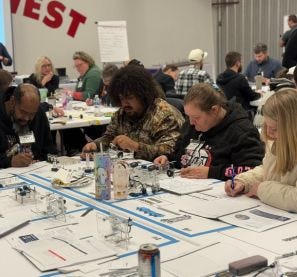 FloraCraft employees work together to complete Lean Training